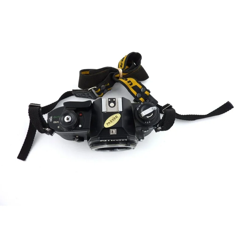 Nikon EM 35mm SLR Film Camera Body Only cam works light meter does not read